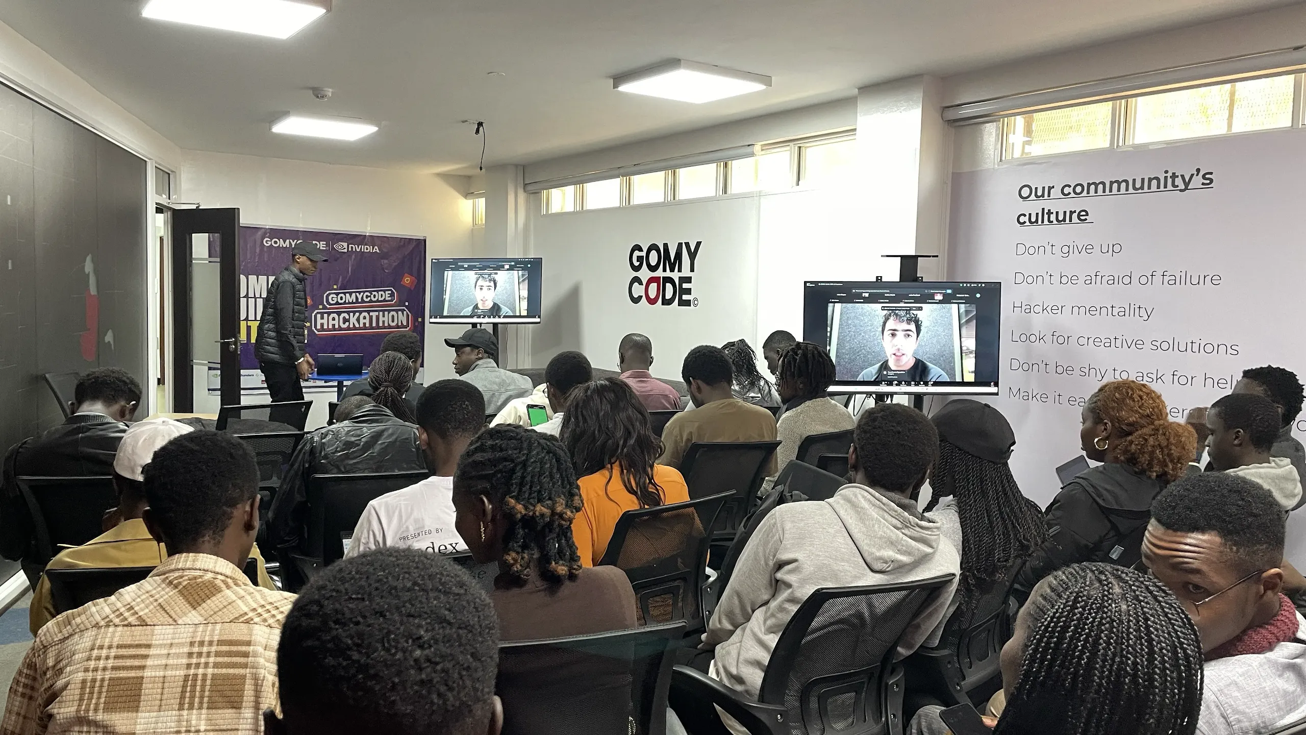 Participants building and following the hackathon at Nairobi.