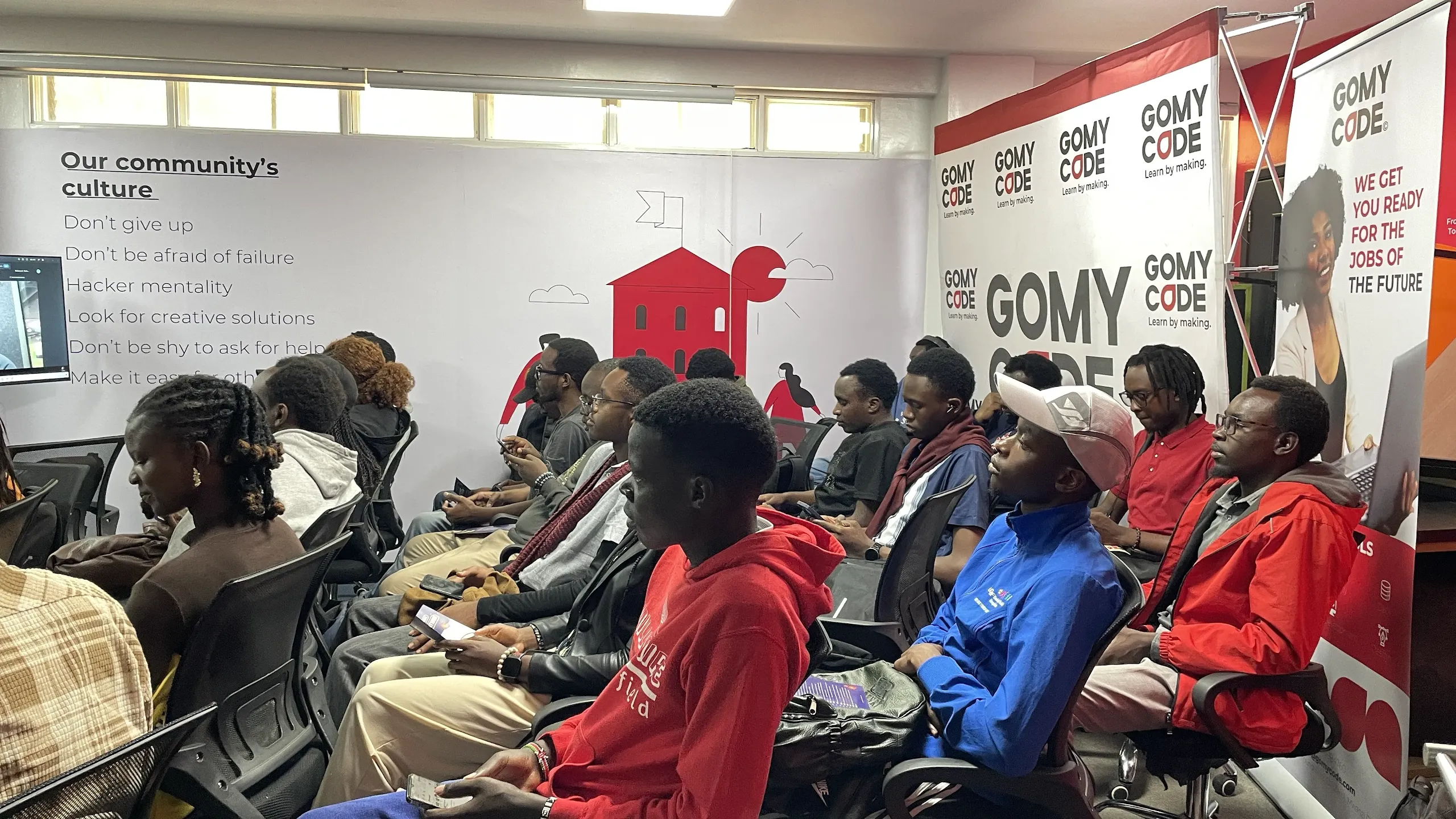 Participants building and following the hackathon at Nairobi.