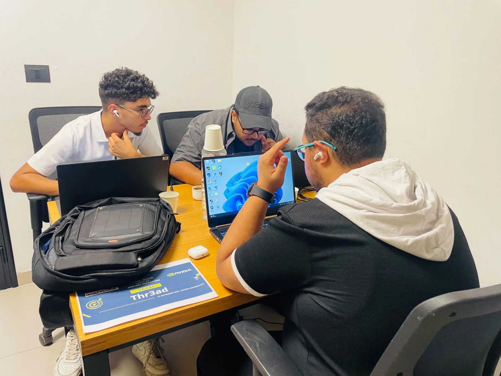 Participants building and following the hackathon at Sousse.