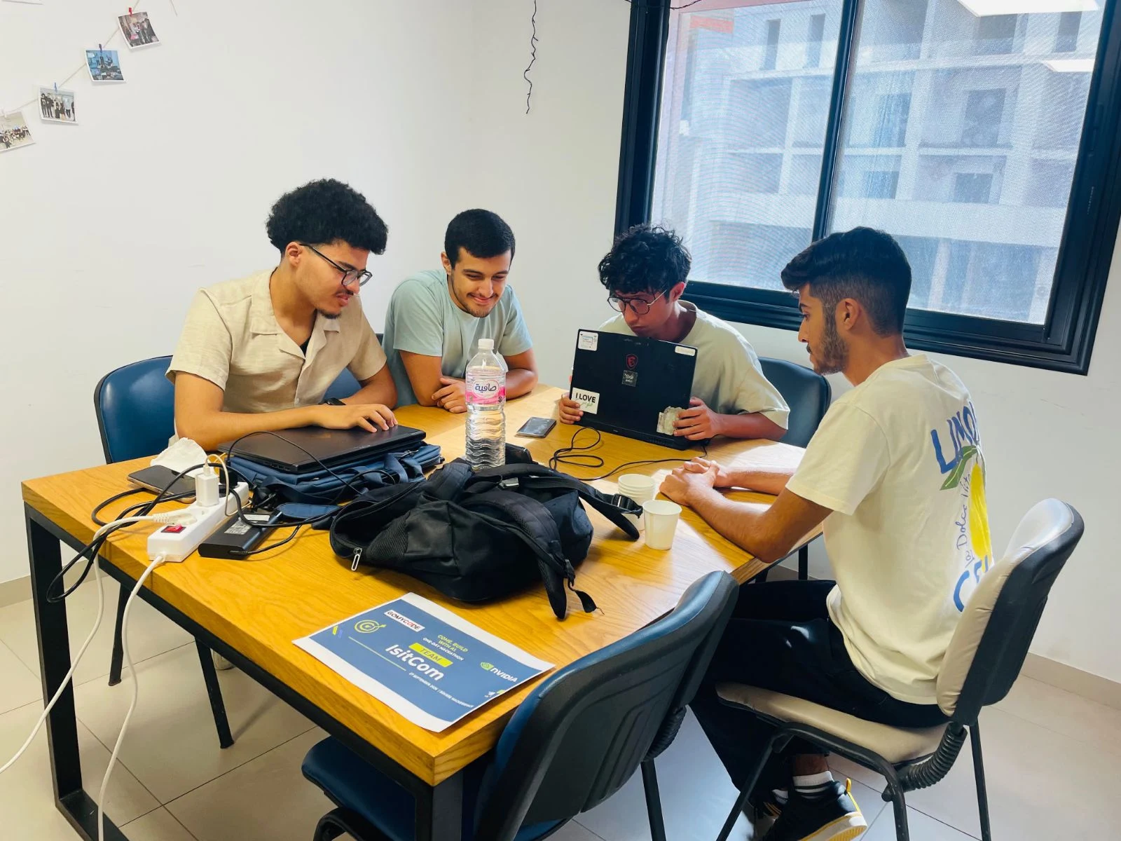 Participants building and following the hackathon at Sousse.