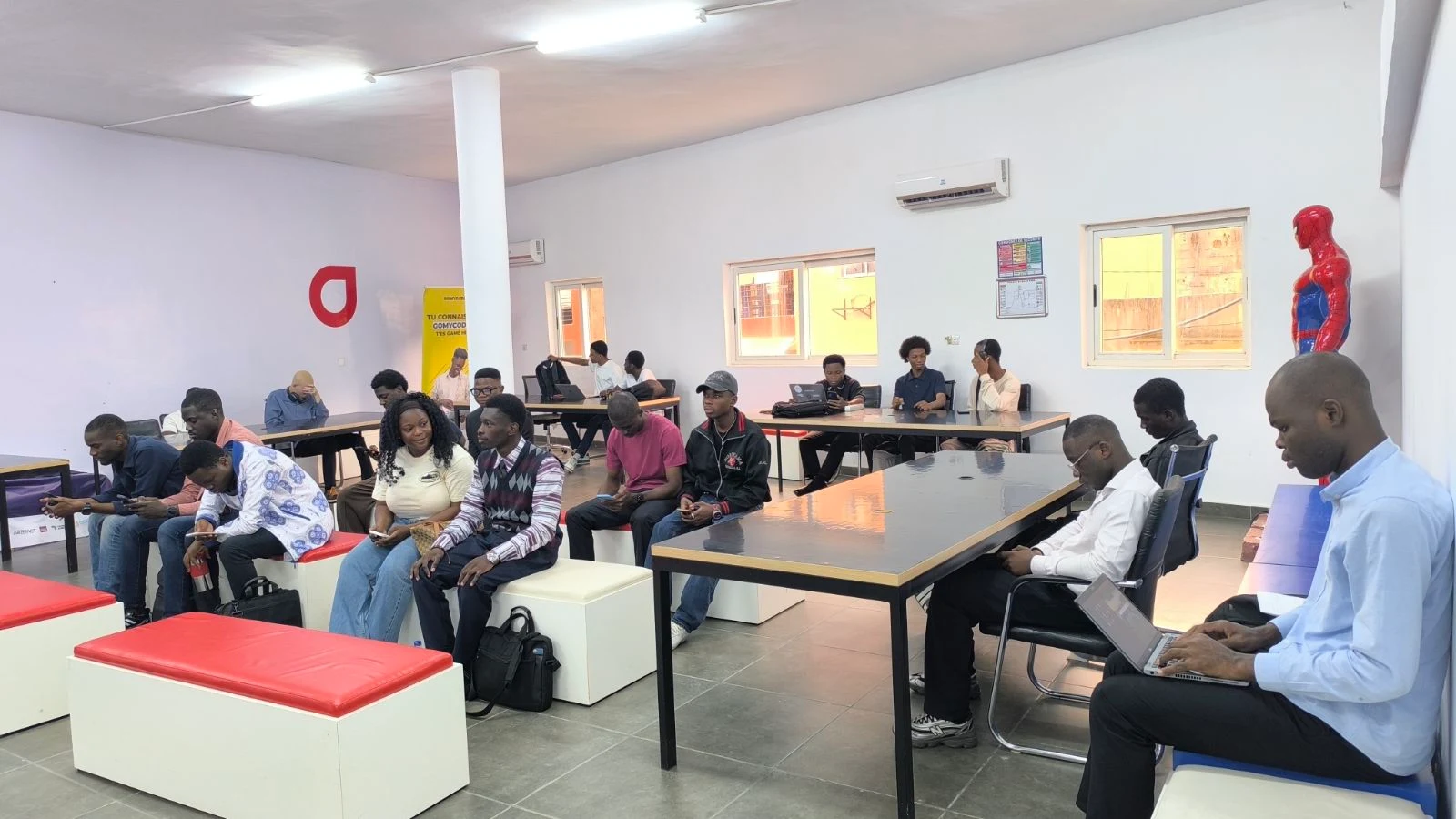 Participants gathered with laptops at Riviera Hackerspace in Abidjan.
